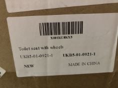 TOILET SEAT WITH WHEELS . (DELIVERY ONLY)