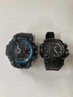 2 X PRIMETIMES GOLIATHS. MODEL PT1943. LIGHTWEIGHT ROBUST CHRONOGRAPHIC SPORT WATCH, 56MM DIAL, 18MM THICKNESS, BLACK FACE AND BLACK SILICONE STRAP WITH BLUE DETAILING. DIGITAL TIME & DISPLAY, GREEN