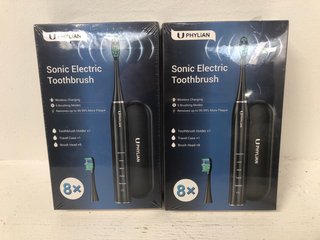 2 X PHYLLIAN SONIC ELECTRIC TOOTHBRUSHES WITH 8 X REPLACEMENT HEADS: LOCATION - A1