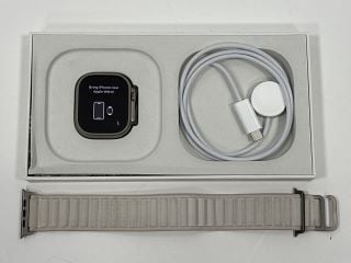 APPLE WATCH ULTRA 49MM TITANIUM GPS + CELLULAR SMARTWATCH: MODEL NO A2684 (WITH BOX, CHARGER CABLE AND STARLIGHT ALPINE LOOP STRAP, SOME SLIGHT COSMETIC MARKS ON CASING) [JPTM114749] THIS PRODUCT IS