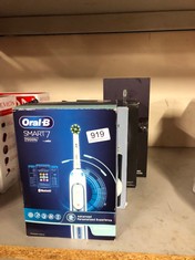QTY OF ITEMS TO INCLUDE ORAL B SMART 7 ELETRIC TOOTHBRUSH: LOCATION - BACK WALL