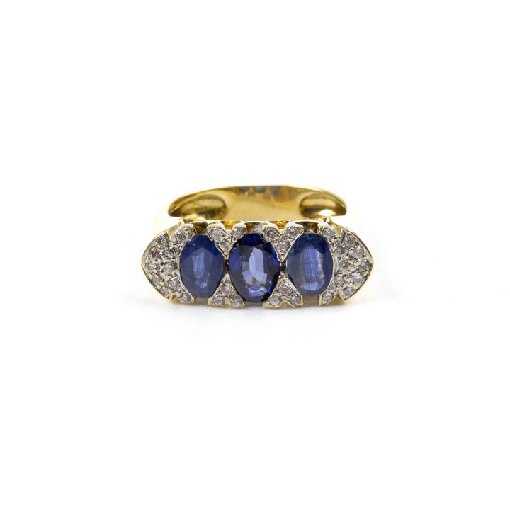 18K Yellow 2.05ct Sapphire and 0.23ct Diamond Pavé Three Stone Ring, Size M, 8g.  Auction Guide: £700-£900 (VAT Only Payable on Buyers Premium)