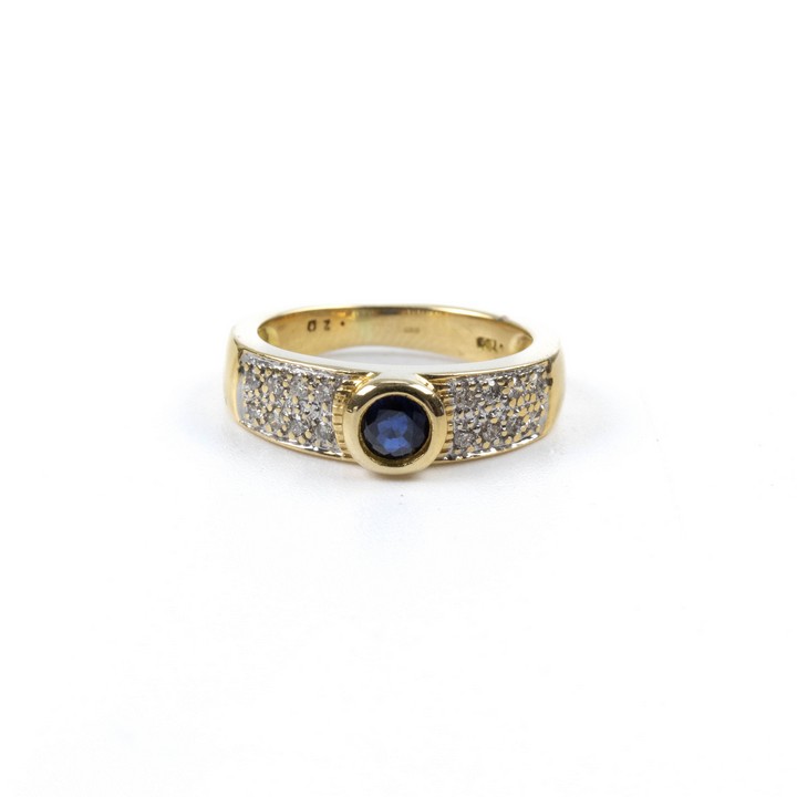 18ct Yellow Gold 0.20ct Sapphire and 0.08ct Diamond Pavé Band Ring, Size L, 6.2g.  Auction Guide: £350-£450 (VAT Only Payable on Buyers Premium)