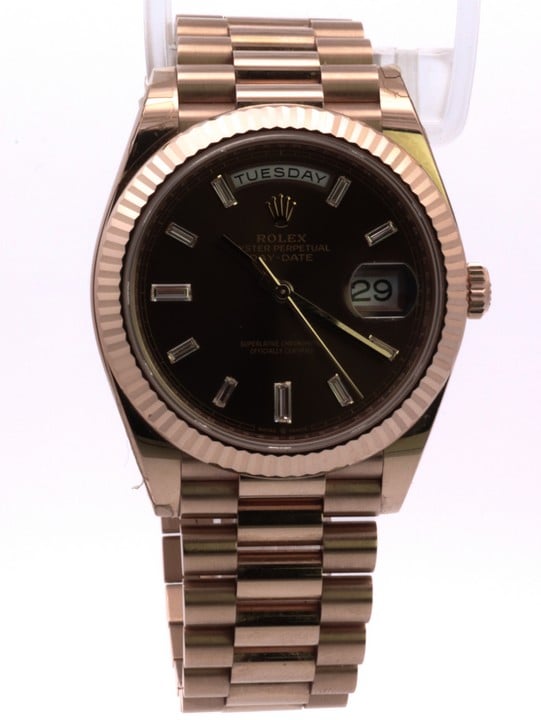 Rolex Day-Date 40 Ref: 228235 Automatic Watch. 40mm 18ct Rose Gold Case with 18ct Rose Gold Fluted Bezel, Chocolate Dial and 18ct Rose Gold President Bracelet. Age: 2022. Comes with guarantee