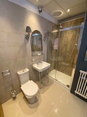 BATHROOM SUITE TO INCLUDE SHOWER CUBICLE AND TRAY, CERAMIC SINK WITH TAPS AND STAND, TOILET, RADIATOR AND ACCESSORIES (RAMS REQUIRED FOR APPROVAL PRIOR TO REMOVING)