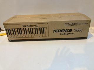 TERENCE FOLDING PIANO