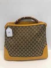 GUCCI, DIANA BAMBOO YELLOW MONOGRAM CANVAS FABRIC HANDBAG WITH BAMBOO HANDLE AND YELLOW REMOVABLE STRAP. ITEM TO INCLUDE STRAP WITH AN ESTIMATED SIZE OF 38*33*9CM (ITEM INCLUDES A CERTIFICATE OF AUTH