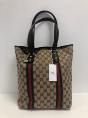 GUCCI, WEB JOLICOEUR VERTICAL TOTE BEIGE/DARK BROWN MONOGRAMMED CANVAS SHOULDER BAG WITH DARK BROWN LEATHER. ITEM TO INCLUDE CHARMS, DUSTBAG WITH AN ESTIMATED SIZE OF 24*31*12CM (ITEM INCLUDES A CERT