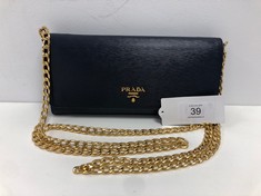 PRADA, WALLET ON CHAIN NAVY TEXTURED LEATHER SHOULDER BAG WITH INTERLACED CHAIN WITH NAVY LEATHER. ITEM TO INCLUDE  WITH AN ESTIMATED SIZE OF 21*10*3CM (ITEM INCLUDES A CERTIFICATE OF AUTHENTICITY) A