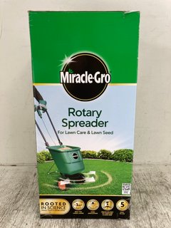 MIRACLE GRO ROTARY SPREADER: LOCATION - D1