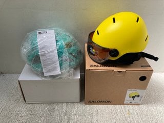 LOCHA BICYCLE HELMET IN TEAL GREEN TO INCLUDE SALOMON BICYCLE HELMET WITH ORCA VISOR IN VIBRANT YELLOW: LOCATION - B9