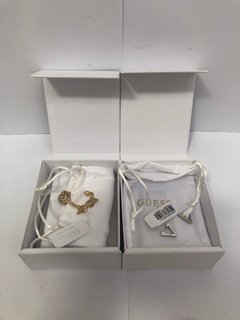 GUESS CRAZY LADIES EARRINGS IN WHITE GOLD TO INCLUDE GUESS NECKLACE IN GOLD: LOCATION - B19