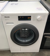 MIELE FREESTANDING WASHING MACHINE MODEL NO: WEA025 RRP £799: LOCATION - FLOOR(COLLECTION OR OPTIONAL DELIVERY AVAILABLE)