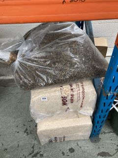 TWO BALES OF WOOD CHIPS AND A SACK OF MEALWORMS