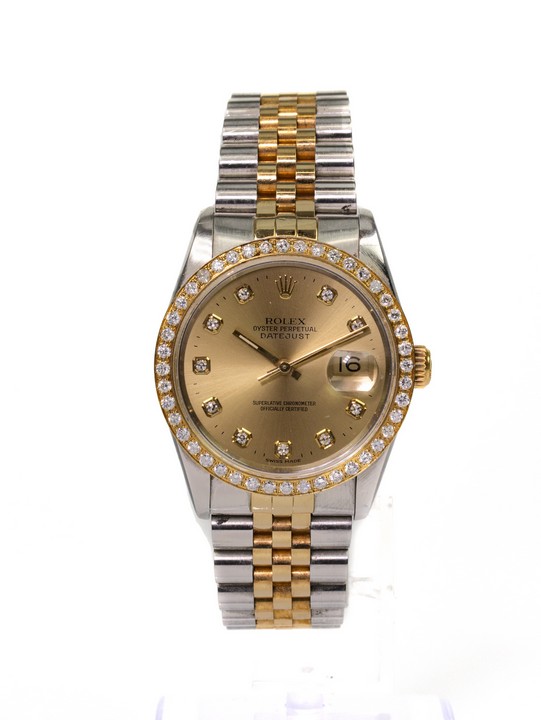Rolex Datejust 36 Ref: 16233 Automatic Watch. 36mm Stainless Steel Case with 18ct Yellow Gold Aftermarket Diamond set Fixed Bezel, Champagne Dial and Stainless Steel & 18ct Yellow Gold Jubilee Bracel