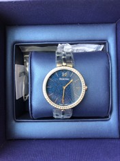 WOMENS STAINLESS STEEL SWAROVSKI WATCH - BLUE DIAL : LOCATION - D RACK