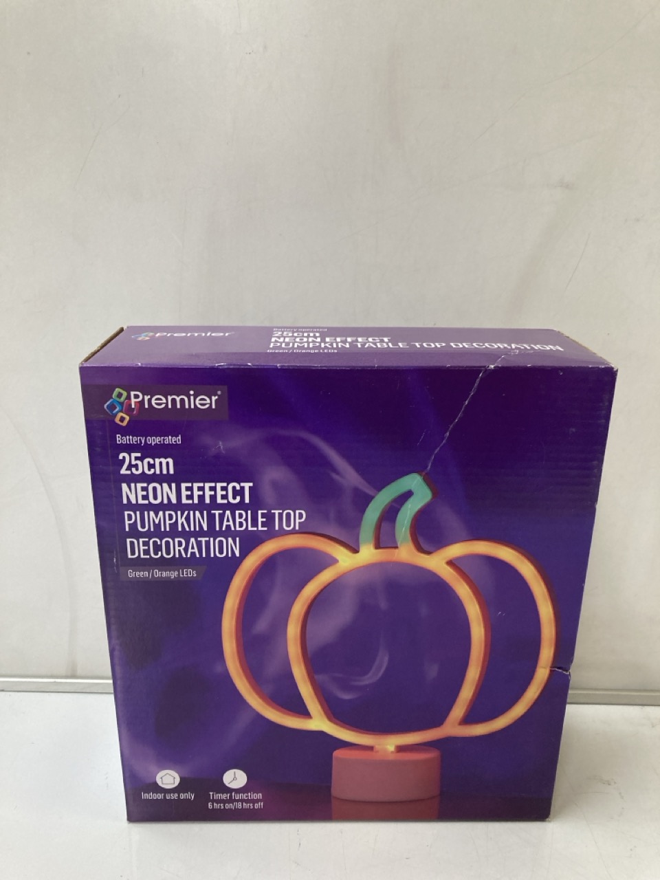 A QTY OF 25CM NEON EFFECT PUMPKIN TABLE TOP DECORATIONS