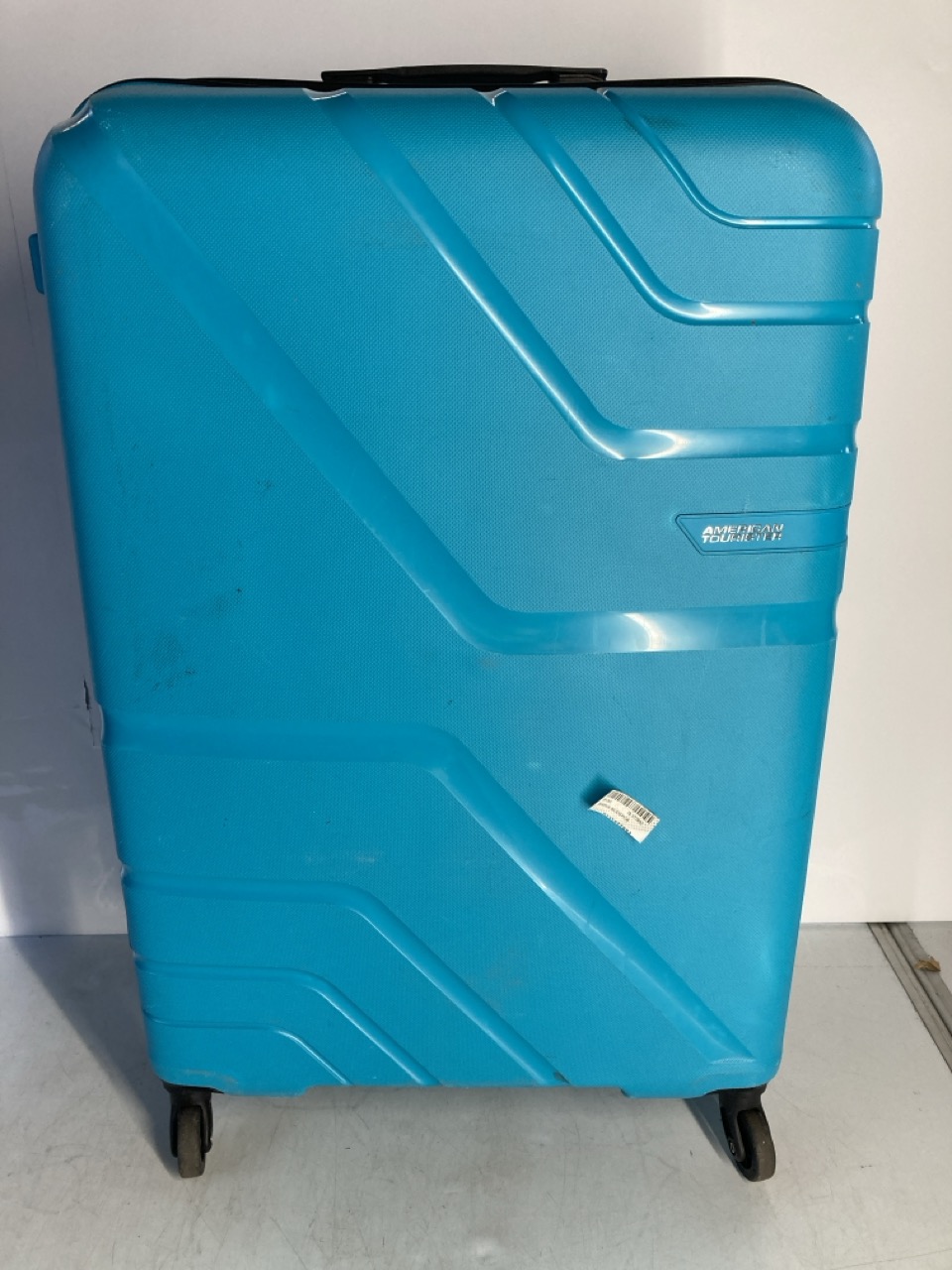 AMERICAN TOURISTER TURQUOISE LARGE SUITCASE
