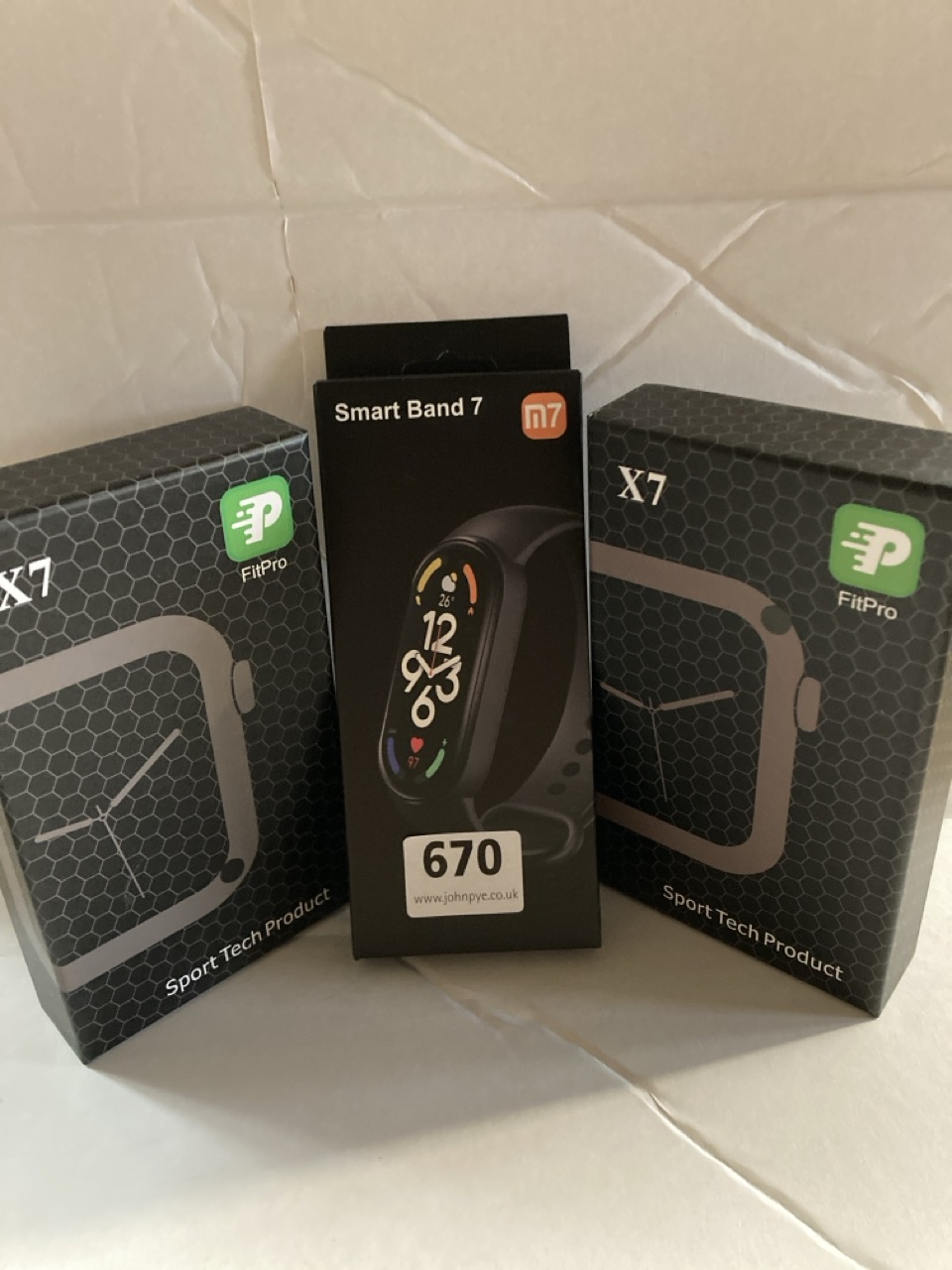 2 X SMARTWATCH "FITPRO X7" WITH BLUETOOTH 4.0, HEART RATE METER, BLOOD PRESSURE METER, SPORT MODE, CAMERA CONTROL AND ALARM. COMPATIBLE WITH ANDROID AND IOS. IN BOX. 1 X M7 SMART BAND 7 UP TO 30 WORK