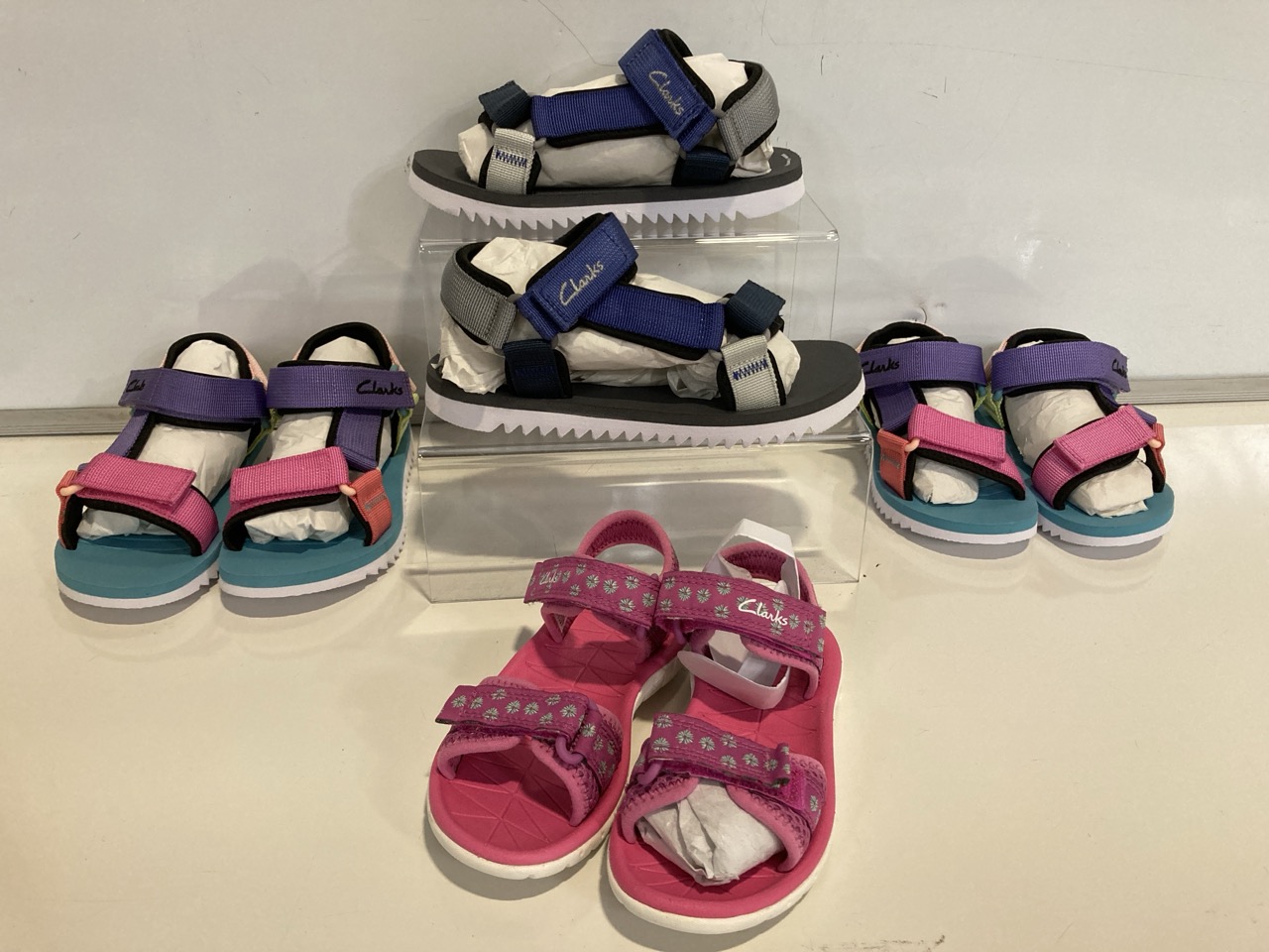 4 X PAIRS OF CLARKS CHILDREN'S FOOTWEAR, TO INCLUDE CLARKS SURF TIDE SANDALS IN HOT PINK, UK SIZE 9