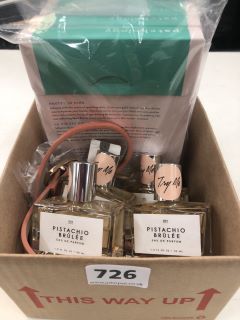 BOX OF ASSORTED ITEMS INC PISTACHIO BRULEE EAU DE PARFUM