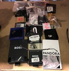 QUANTITY OF ITEMS TO INCLUDE MENS HUGO BOSS EARRINGS : LOCATION - C