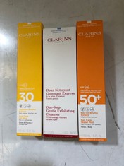 APPROX 7 X ASSORTED CLARINS PRODUCTS TO INCLUDE SUN CARE OIL MIST 150ML (DELIVERY ONLY)