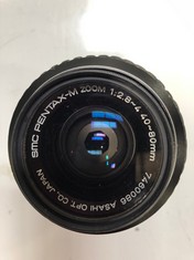 A PENTAX ZOOM LENS IN BAG (DELIVERY ONLY)