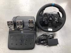 LOGITECH STEERING WHEELS AND PEDALS BLACK COLOUR.
