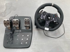 LOGITECH PEDALS AND STEERING WHEEL BLACK COLOUR.