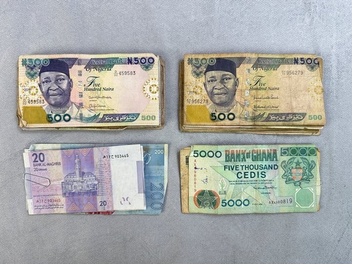 Selection Of Currency, Including Approx 37,900 Nigerian Naira, 7000 Ghanaian Cedi, 480 Moroccan Dirhams, Algerian Dinars, Malaysian Ringgit (VAT ONLY PAYABLE ON BUYERS PREMIUM)