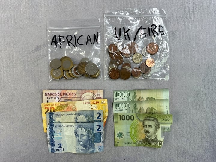 Selection Of Currency, Including Approx 50 Mexican Pesos, 20 Brazilian Vinte Realise/4 Pios Reais, 200 Chilean Mil Pesos. UK/Eire Coins, Selection Of African Currency, Including Coin(s) from Egypt, R