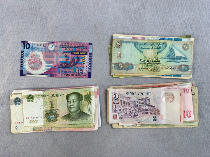 Selection Of Currency, Including Approx 982 Chinese Yuan,Turk Lirasi, 400 Vietnamese Dong, Honk Kong Dollars, Japanese Yen, UAE Dirhams, Indonesian Rupiah, Syrian Pounds, Singaporean Dolla