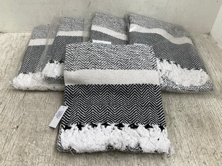 5 X PATTERNED THROWS IN BLACK/WHITE: LOCATION - E8