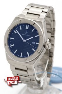 MENS BERNARD REINHARDT WATCH. FEATURING A BLUE DIAL, SILVER COLOURED BEZEL AND STAINLESS CASE, DATE, W/R 5ATM. SILVER COLOURED STAINLESS BRACELET. COMES WITH A WOODEN PRESENTATION CASE: LOCATION - E5