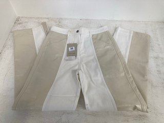 JIGSAW BACK PATENT PANELLED JEANS IN CREAM SIZE: 28 RRP - £160: LOCATION - WHITE BOOTH