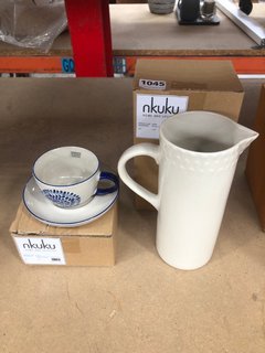 NKUKU ELA JUG IN CREAM WITH ESHANI CUP AND SAUCER IN INDEGO: LOCATION - BR
