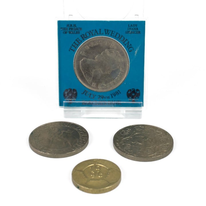 1996 Football Coin, 2.8cm, 16g. 1981 Royal Wedding Commemorative Coin and Two 1977 Elizabeth II DG.REG FD Coins, 3.8cm, 28.2g each (VAT Only Payable on Buyers Premium)