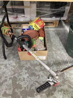 A HEDGE TRIMMER AND A BOX OF GARDEN ACCESSORIES TO INCLUDE BIG CHEESE BLOCK BAIT