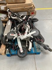 7 X BROKEN ELECTRIC SCOOTERS FOR PARTS OR SPARES .