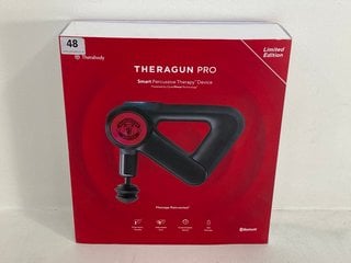 THERABODY LIMITED EDITION MANCHESTER UNITED DESIGN THERAGUN DEEP TISSUE MASSAGER - RRP £400: LOCATION - FRONT BOOTH