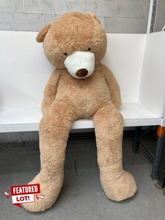 6 FOOT 5'' TEDDY BEAR PLUSH WITH ZIP IN LIGHT BROWN: LOCATION - WHITE BOOTH