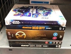 QUANTITY OF DVDS INCLUDE THE KINGSMAN COLLECTION - ID MAY BE REQUIRED: LOCATION - D RACK