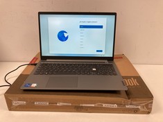 LENOVO THINKBOOK 15 G2ITL 256 GB LAPTOP IN SILVER. (WITH BOX AND CHARGER, KEYBOARD WITH FOREIGN LAYOUT / TOUCH MOUSE NOT WORKING / ONE LETTER MISSING FROM KEYBOARD, SEE PHOTOS). I5-1135G7, 8 GB RAM,