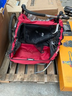 REAR MOUNTED BICYCLE TRAILER IN RED AND BLACK: LOCATION - B7