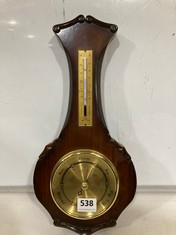 A WALL HUNG BAROMETER