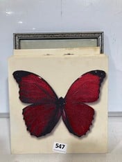 A FRAMED ANTIQUE PICTURE AND THREE BUTTERFLY PRINTS ON CANVAS