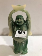 A GREEN BUDDHA FIGURE