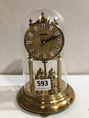 A DOMED MANTEL CLOCK