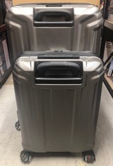 2 SAMSONITE SUITCASES ONE BIG ONE SMALL COLOUR GRAY WITH INDENTED LINES DESIGN: LOCATION - D